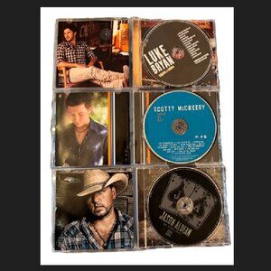 Three CDs (Luke Bryan, Scotty McCreery & Jason Aldean) Preowned